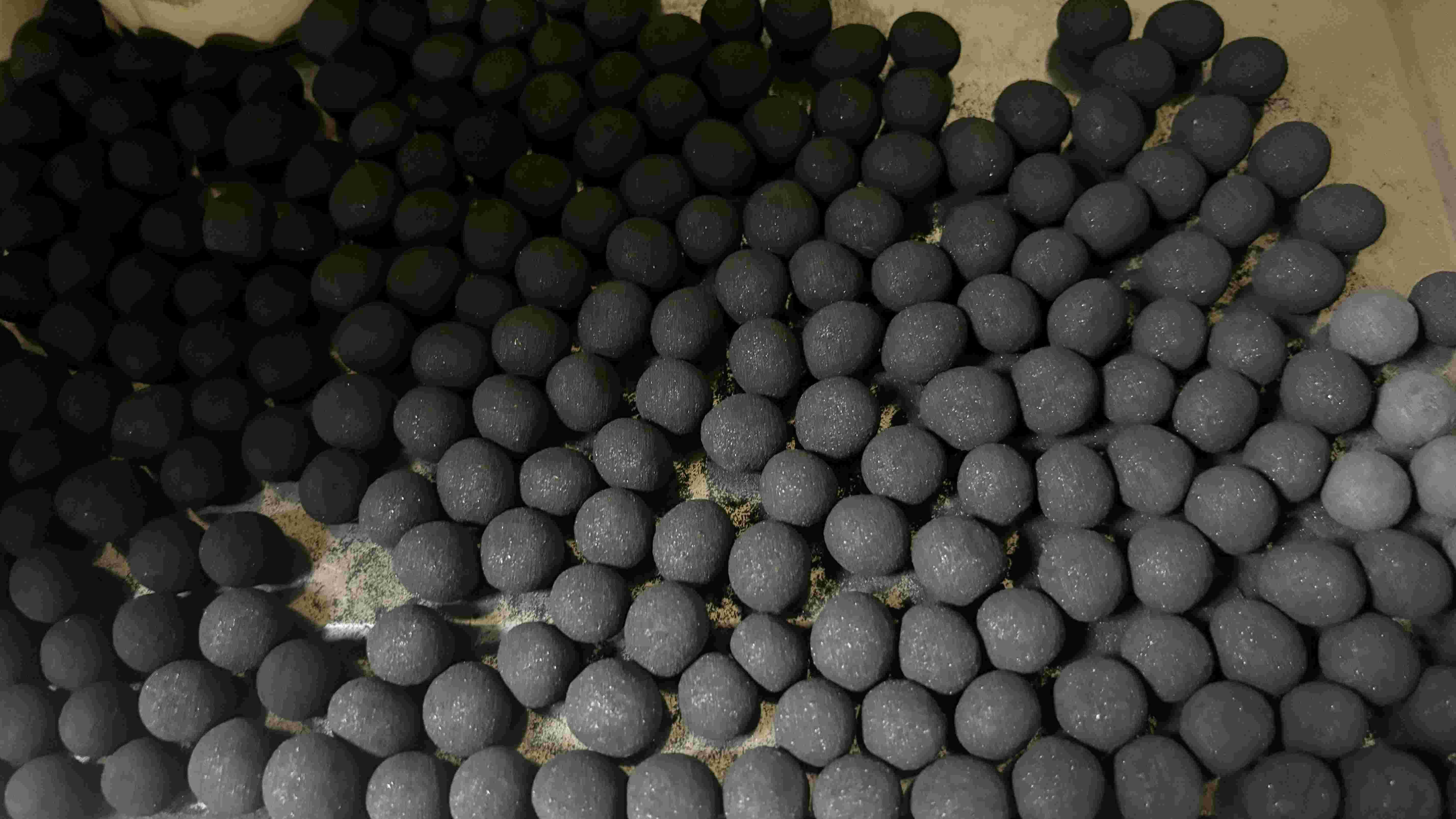 球團礦的爆裂溫度是什么 ？